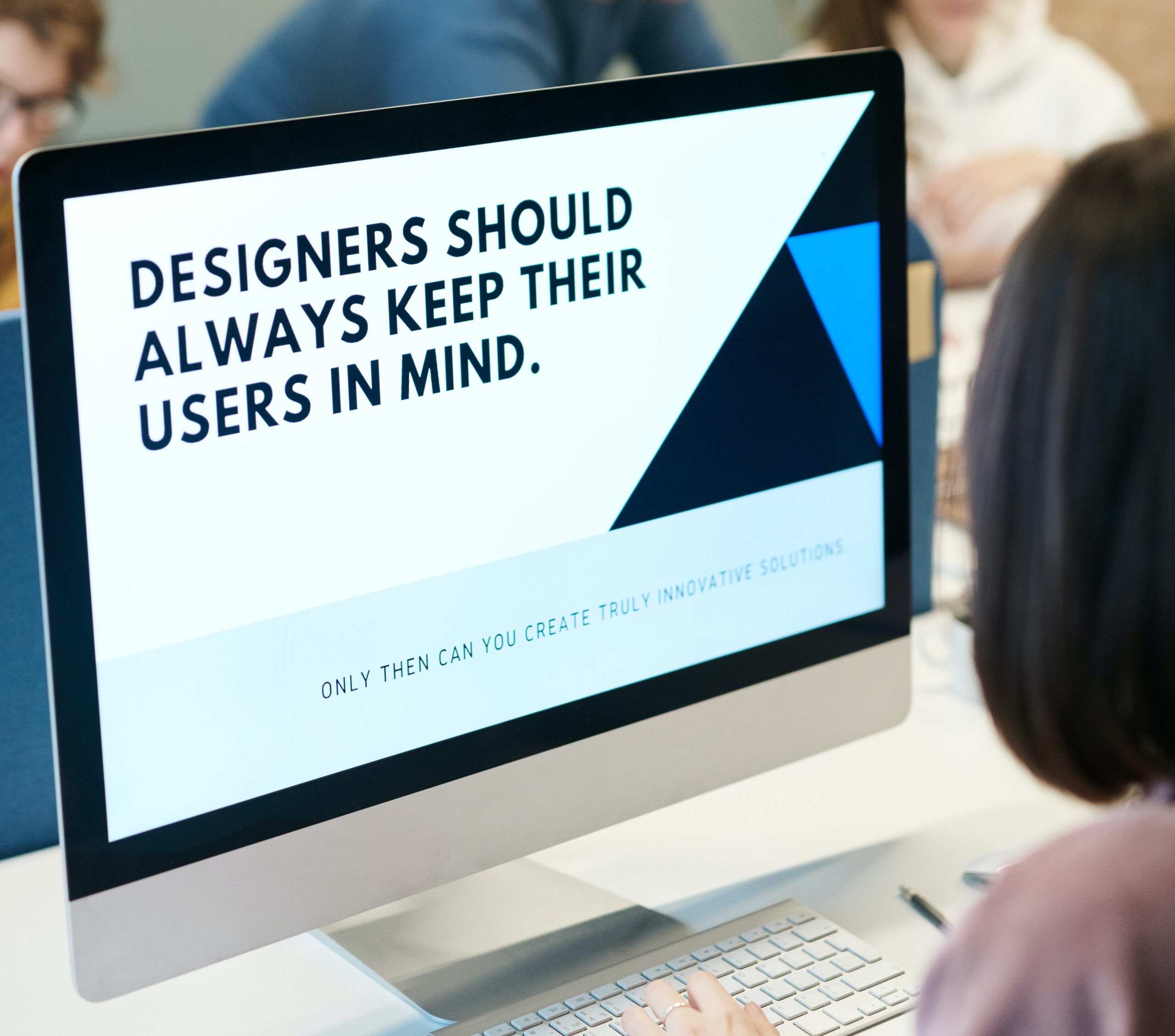 a computer screen displays "designers should always keep their readers in mind"